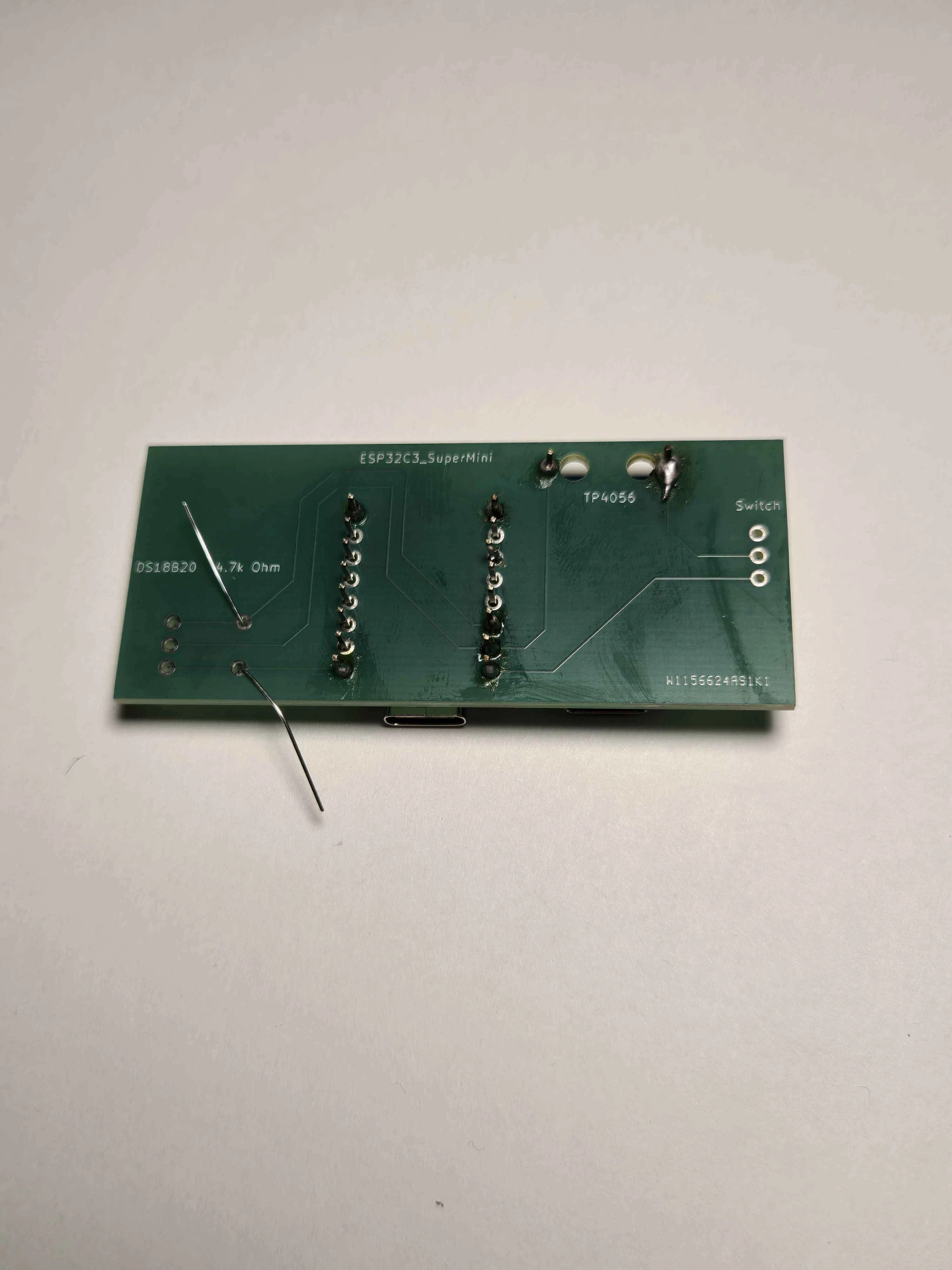 ESP32-C3 header pins soldered to the carrier