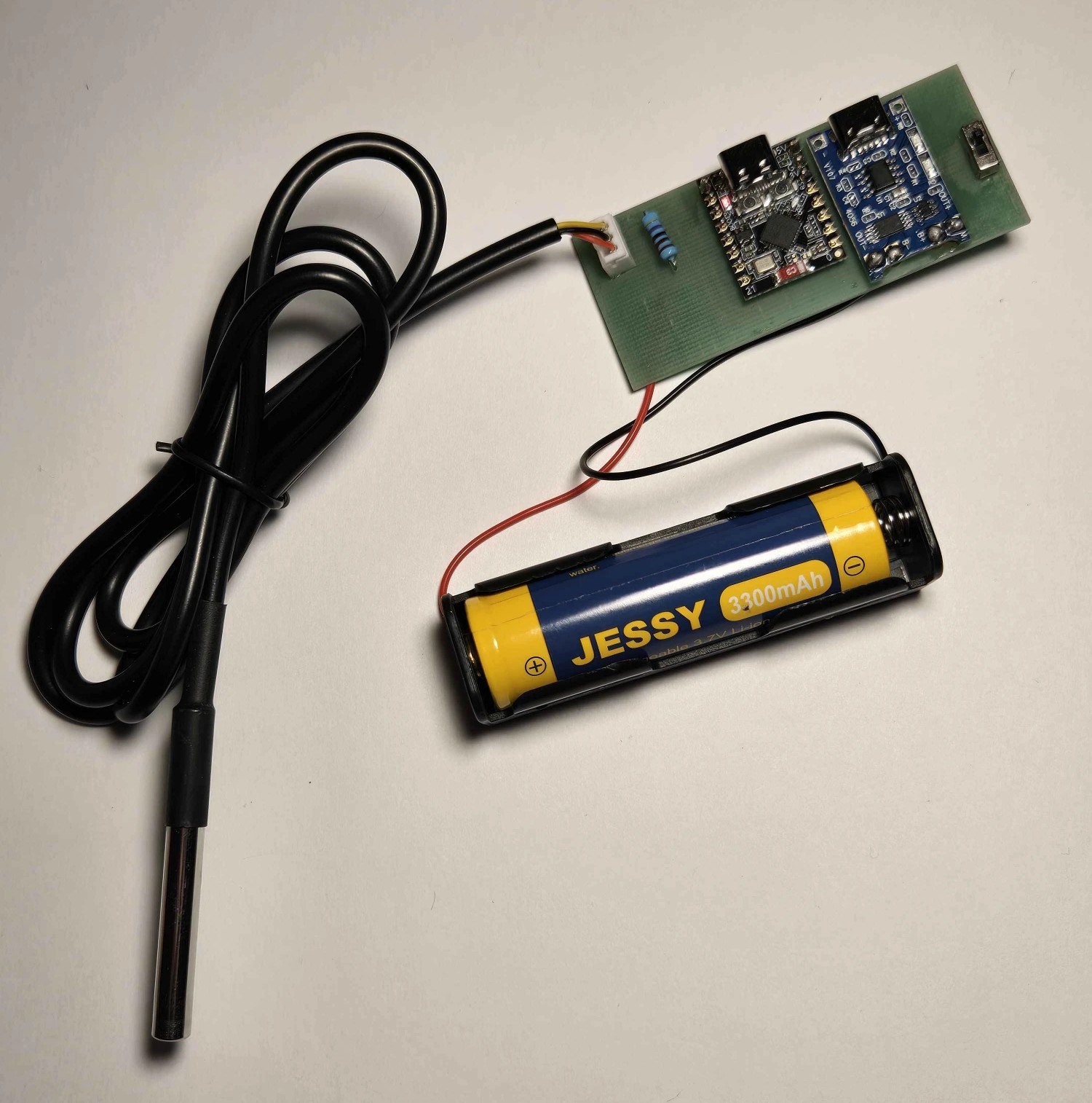 Finished Setpoint unit: probe, carrier board, and 18650